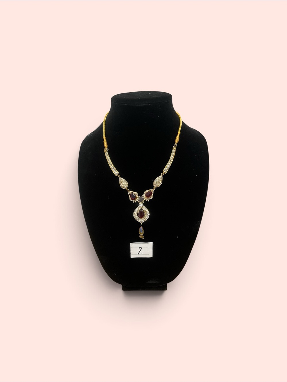 Gold-Tone Necklace with Deep Red Gemstone Pendant